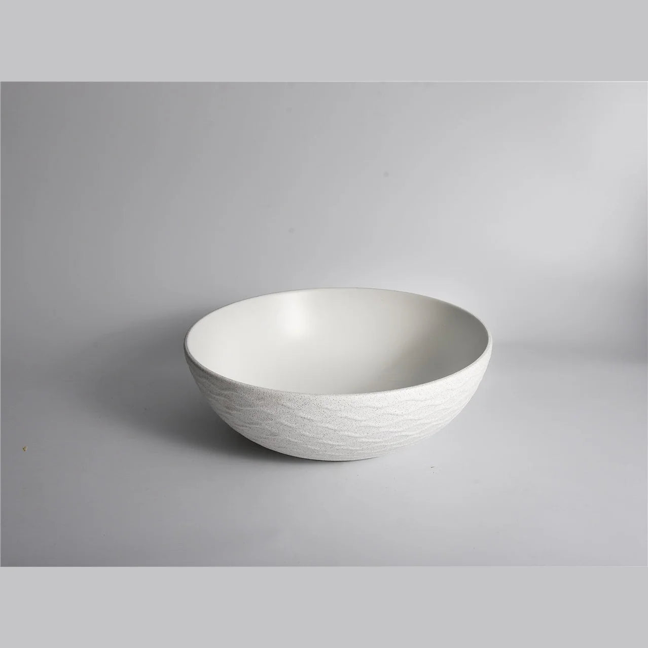Claya above-counter ceramic basin - Polar-40-Wavy Textured White